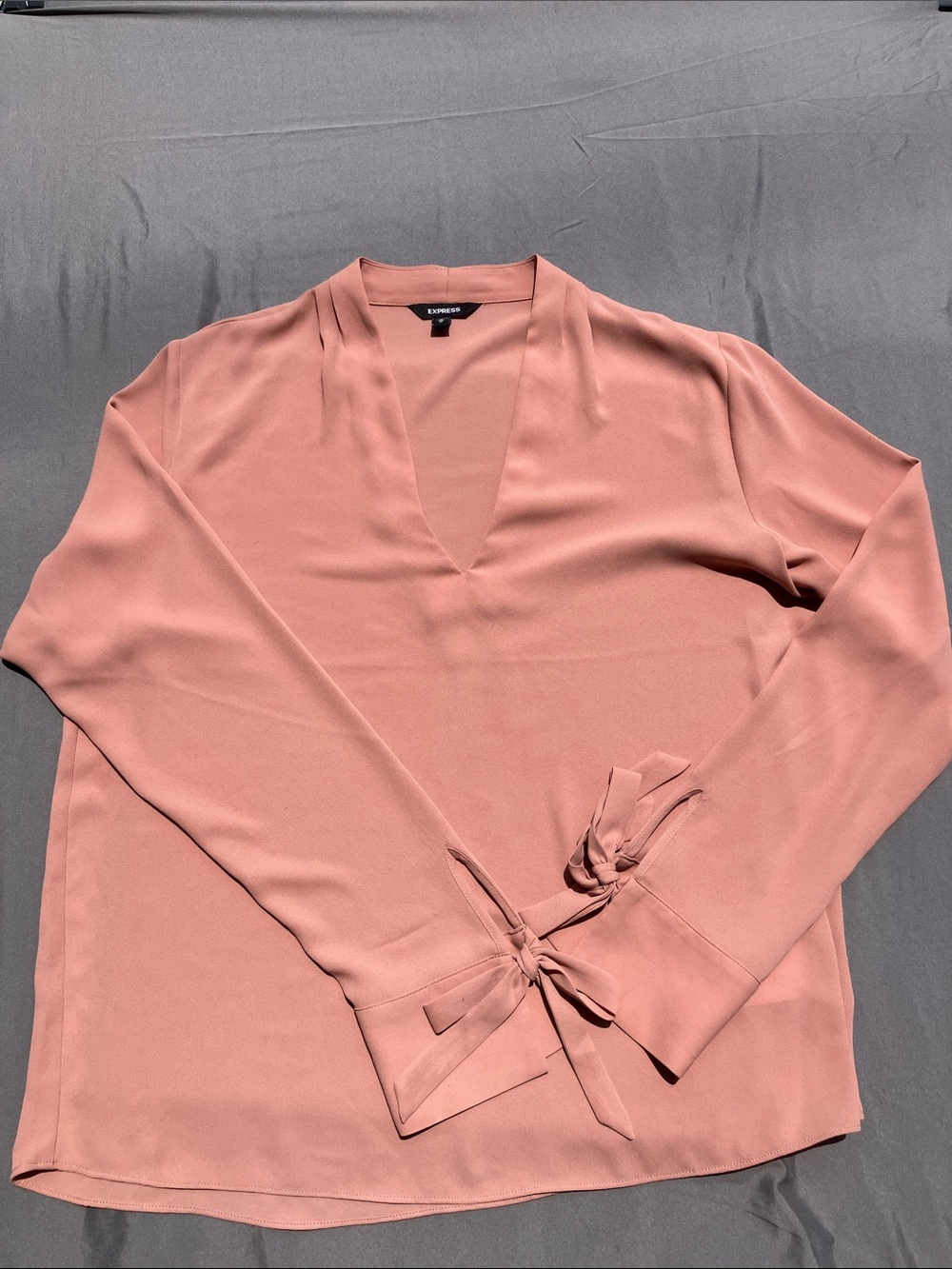 Express Blush V-Neck Long Sleeve Blouse with Bow Tie Cuffs